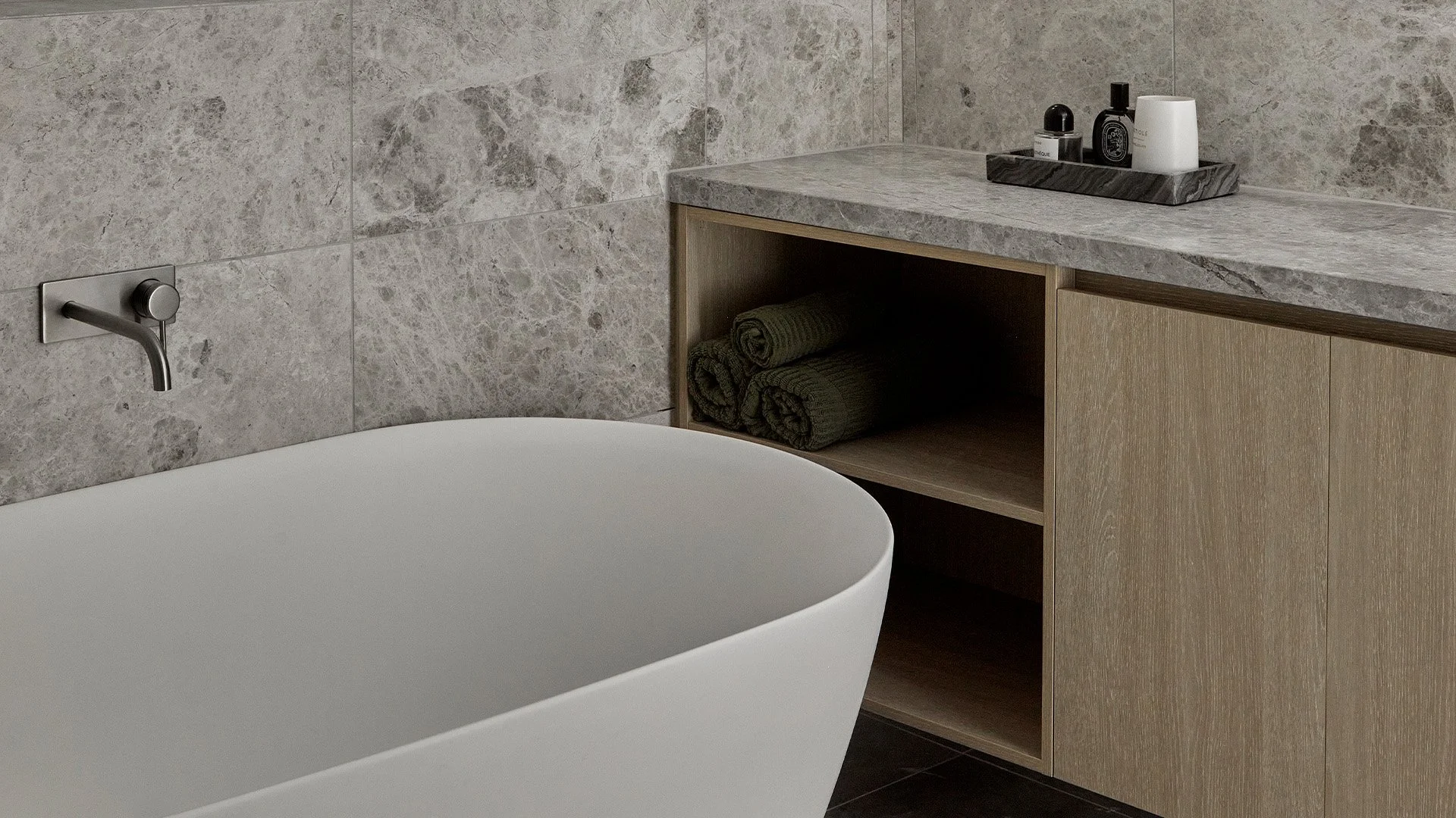 Custom timber bathroom vanity with stone surface