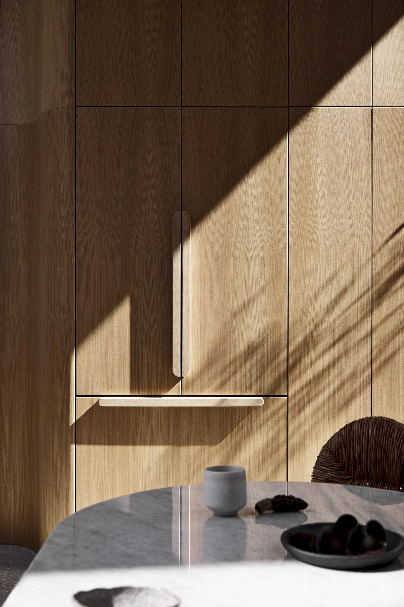 Floor-to-ceiling timber wardrobe joinery